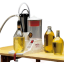 Pullotuskone Enolmatic viskoosisten nesteiden pullotukseen Oil-sarja